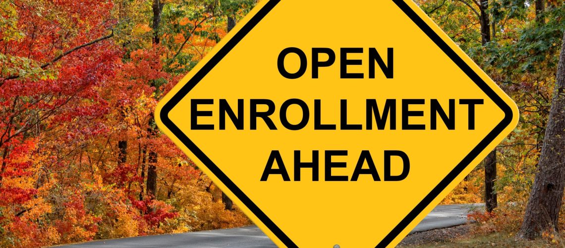 Open Enrollment Caution Sign With Autumn Road Background